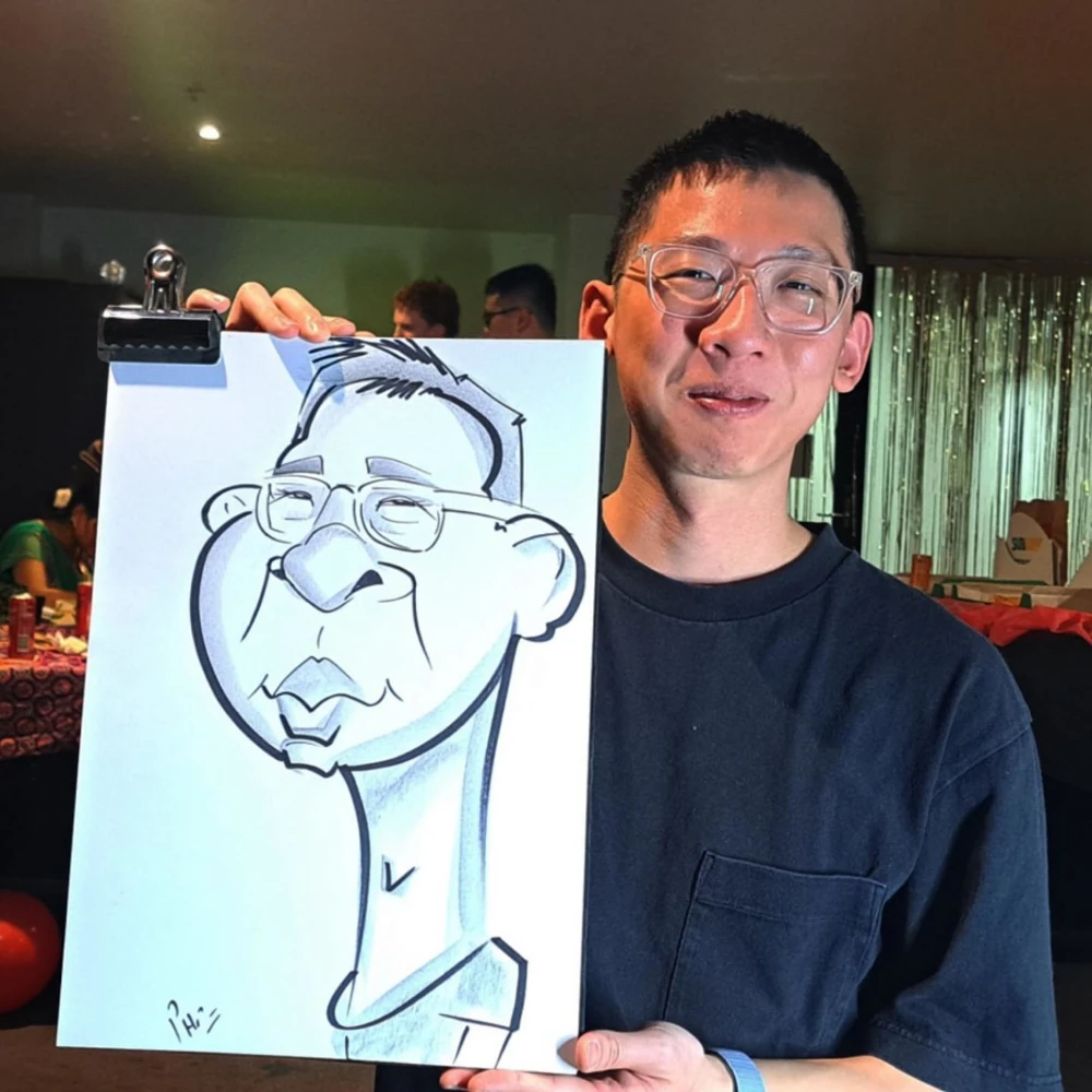 lady with poka dots with caricature at melbourne wedding