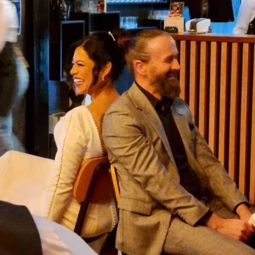 happy guests at wedding with their live caricature