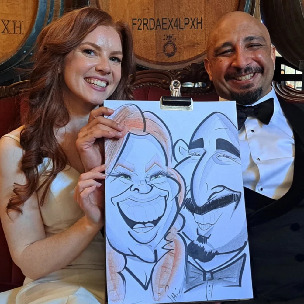 happy guests at wedding with their live caricature