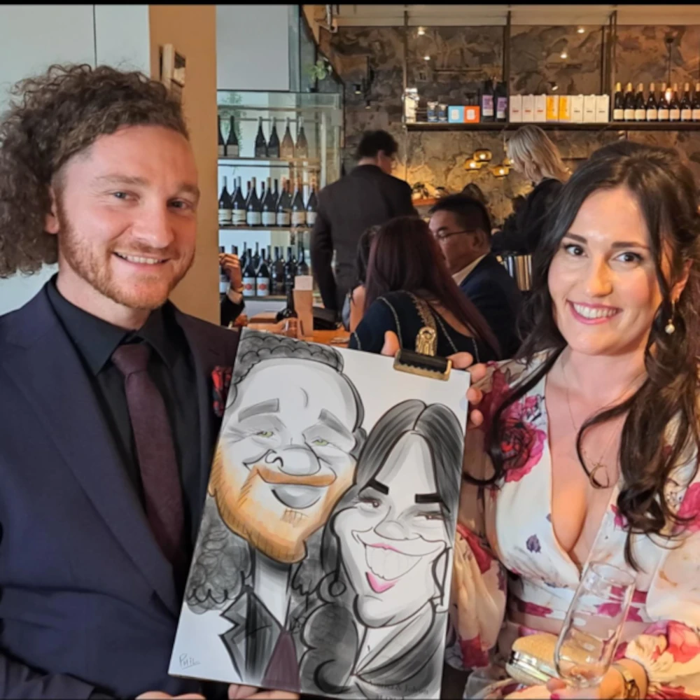 lady with poka dots with caricature at melbourne wedding